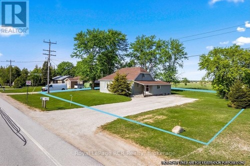 With double wide lot offering excellent exposure.