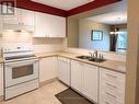 Kitchen with dishwasher and double sink