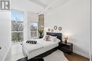 2nd bedroom w/floor to ceiling windows