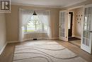 Living Room with bay window, hardwood floors