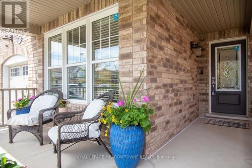 covered front porch & interior garage access