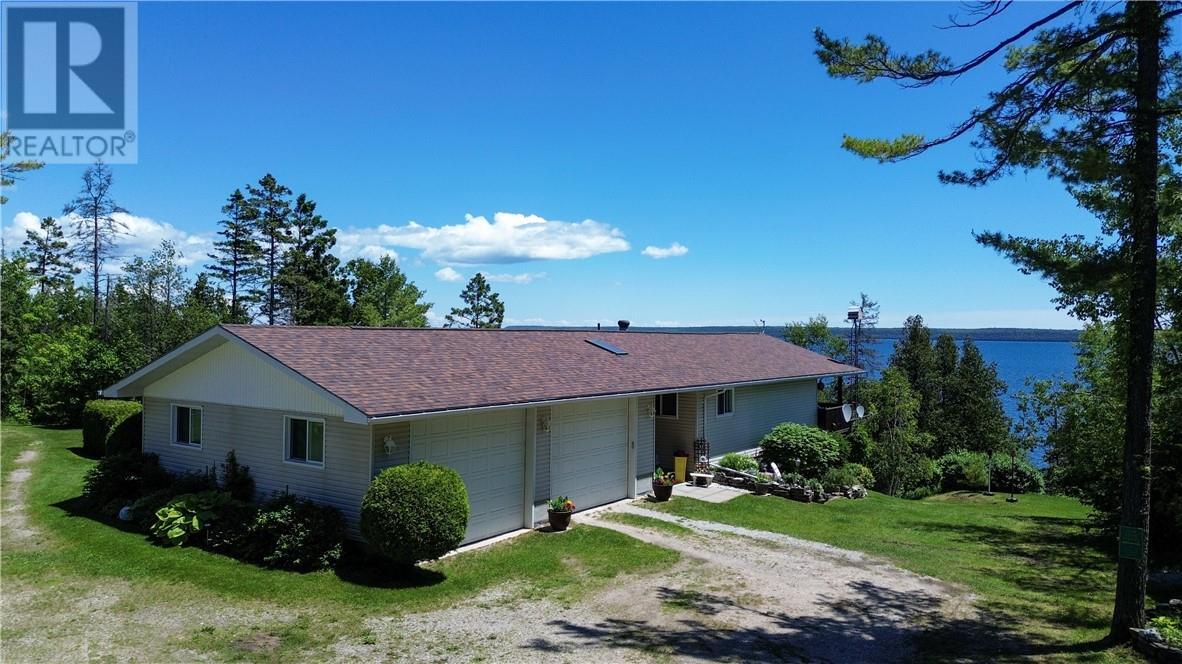 












238 Lonesome Pine Trail

,
Tehkummah, Manitoulin Island,




Ontario
P0P2C0

