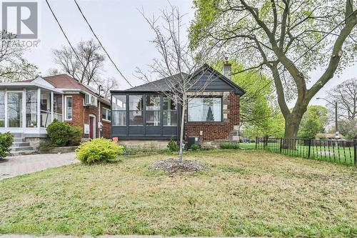 Classic all brick bungalow with front porch