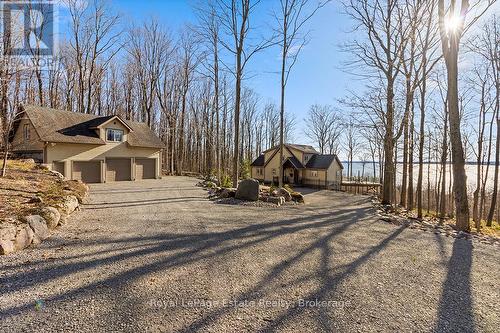House with separate three car garage