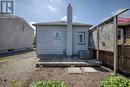 Rear of home with deck