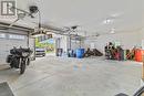 Triple Car Garage with Stairs to Basement