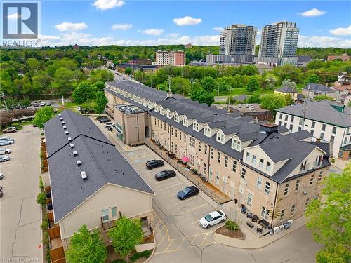 Aerial perspective showcasing a multi-building complex with stone and siding exteriors