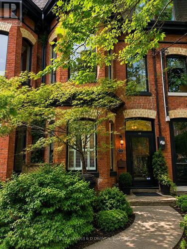 Striking red brick Victorian w/ polychrome facade