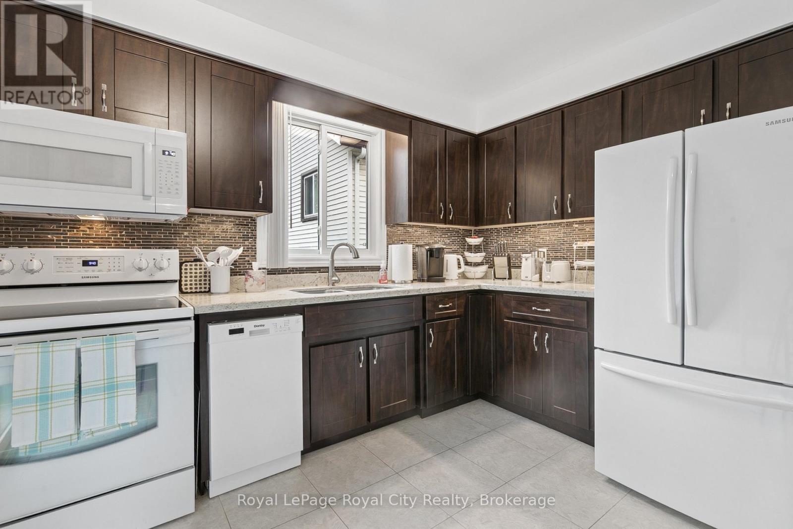 












406 IRONWOOD ROAD

,
Guelph (Kortright West),




Ontario
N1G3N8

