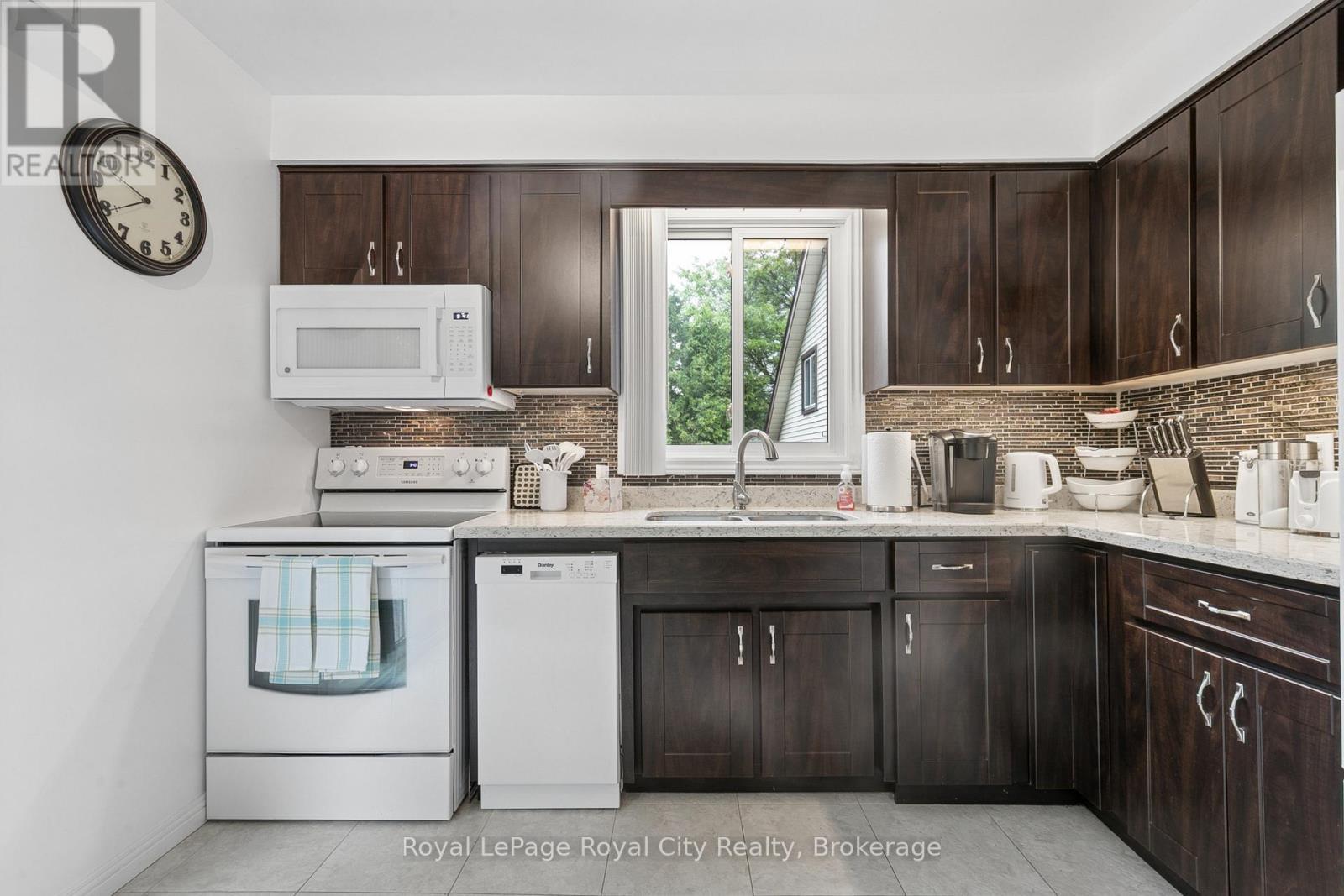 












406 IRONWOOD ROAD

,
Guelph (Kortright West),




Ontario
N1G3N8

