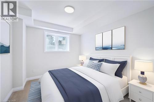 Carpeted bedroom with baseboards