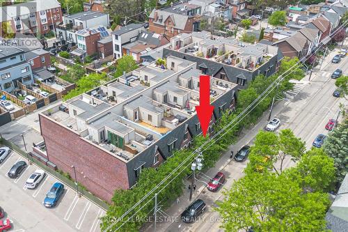 Aerial shot w/ arrow indicating property location