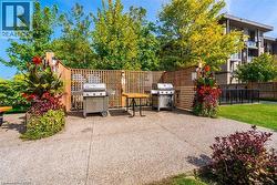 Outdoor patio area featuring exposed aggregate concrete flooring