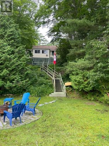 Steps from back deck to large yard
