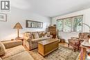 Hardwood flooring and abundant natural light from multiple windows