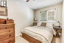 Bedroom featuring neutral wall tones, carpeted flooring, and a ceiling fan