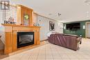 lower level gas fire place and rec area