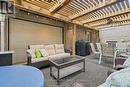 Back Yard Patio with third garage door for access