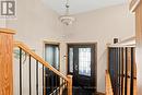 Stairs to Main Floor from Front Door