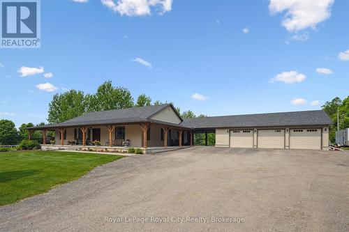 House Front-wrap around porch, breezeway to garage