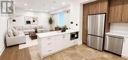Virtually Staged Kitchen Overlooking Family Room