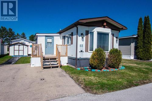 Driveway for 2 cars with the shed in background