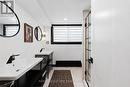 Lower Level 3 Pcs Trendy Bath with walk-in shower