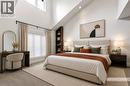 Master Bedroom. Spacious interior room with new neutral carpeting and soaring ceilings, walk-in closet and ensuite