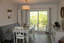 The dining room can accommodate a large table and has plenty of room for a china cabinet or buffet hutch as seen.