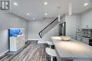 laminate flooring, potlights, newer kitchen