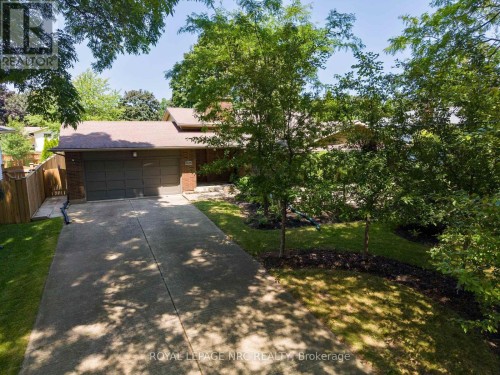 Private front landscaping adds curb appeal