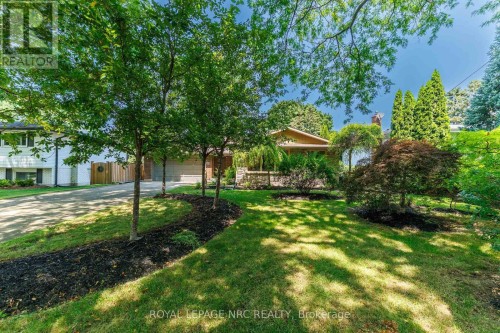 Private front landscaping adds curb appeal