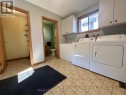 Main Floor Laundry, 2-Pc Bath, & Storage