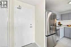 Foyer with closet and kitchen