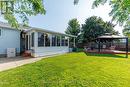 Sunroom Exterior - Windows Facing Backyard