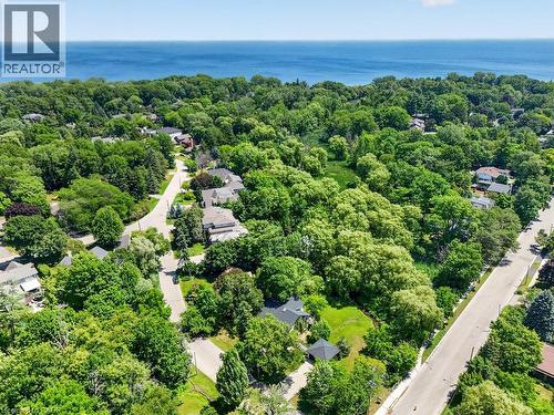 Expansive waterscape, abundant mature trees, and residential streets