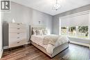 neutral wall palette, window coverings with auto power roller shades