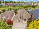 Aerial view-backing onto Coyle Creek Park & pond
