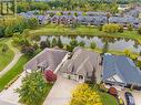 Aerial view of pond and park walking paths