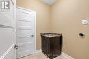 Main floor laundry hookups; appliances downstairs