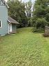 Side of the House with entrance to mudroom