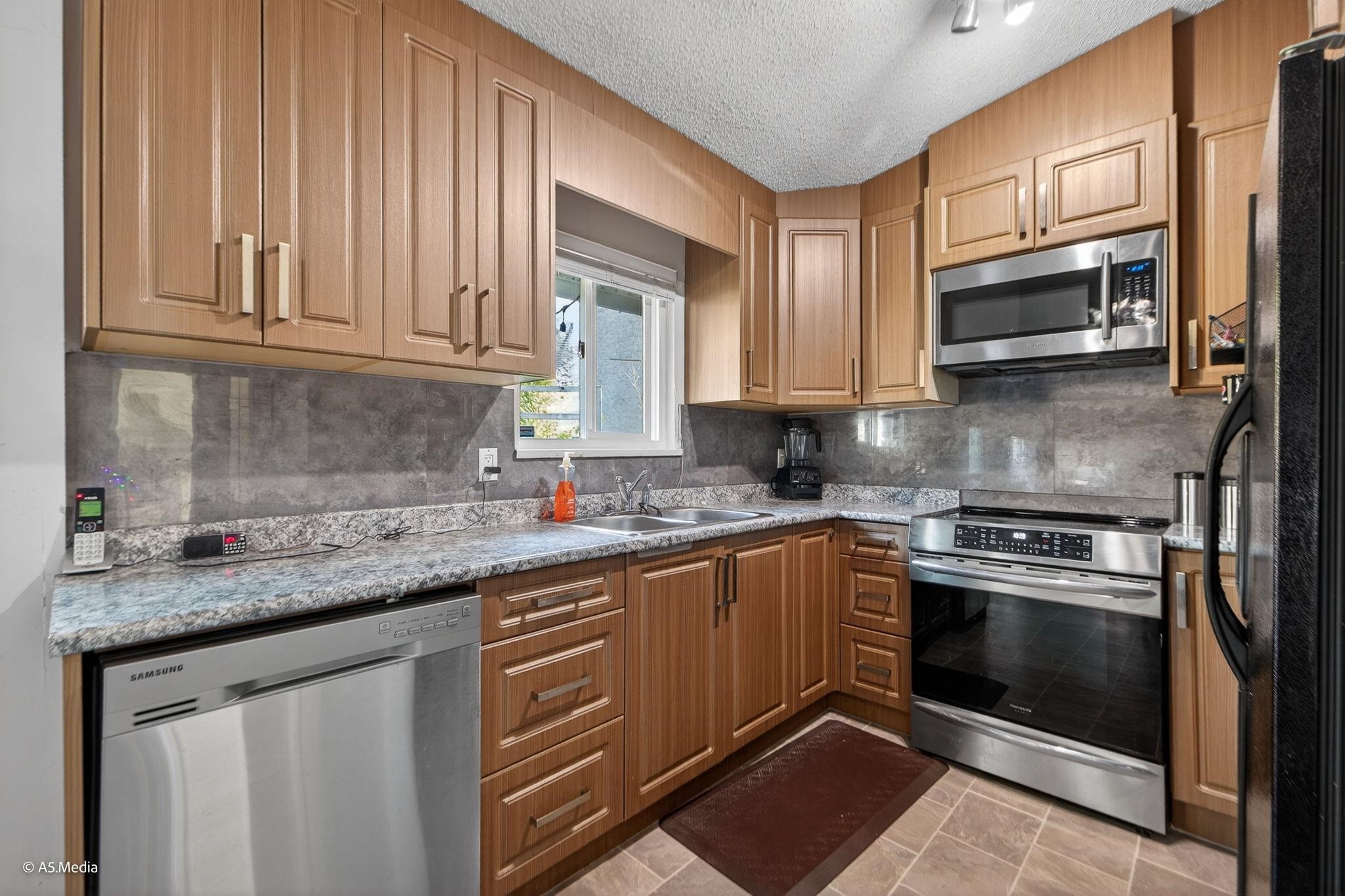 









12235


80a

Avenue,
Surrey,




BC
V3W 7R8

