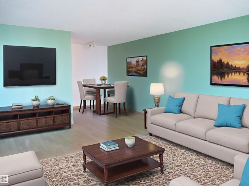 Living room featuring wood finished floors and baseboards