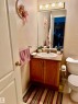 Bathroom featuring vanity and tile patterned floors