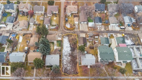Aerial overview of property's location featuring nearby suburban area