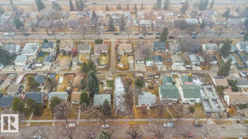 Aerial view of property's location with nearby suburban area