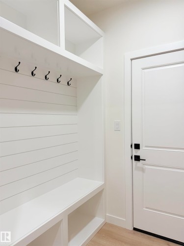 Mudroom with light wood-type flooring