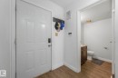 Main Floor Bathroom with vanity and dark wood finished floors