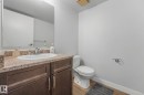 Bathroom with vanity and light wood finished floors