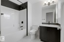 Bathroom with vanity and shower / bath combination